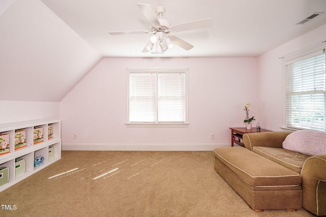 sitting room featuring baseboards, a ceiling fan, carpet flooring, and visible vents
