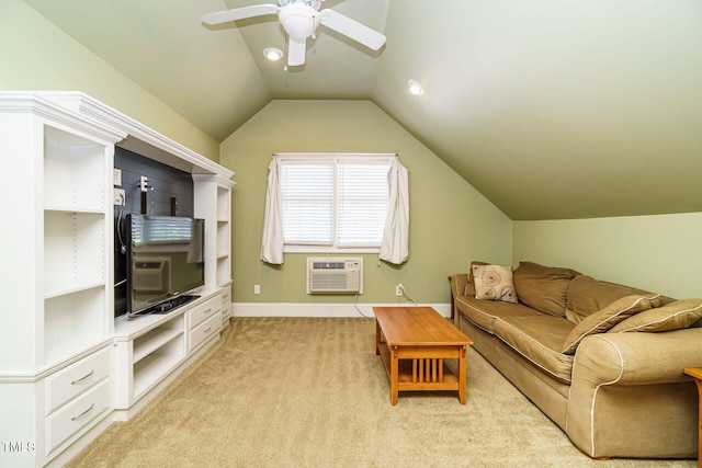 living area with lofted ceiling, light carpet, baseboards, a wall mounted AC, and a ceiling fan