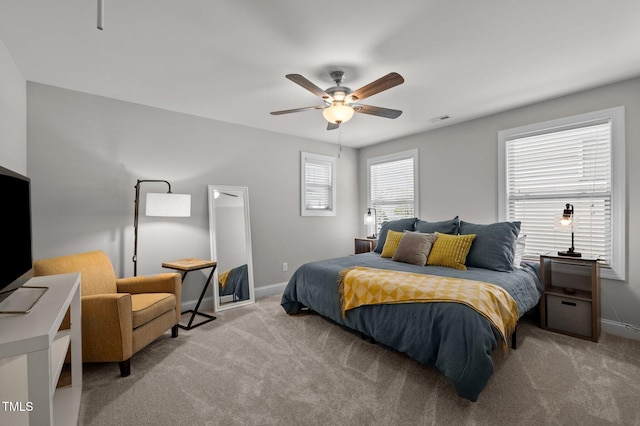 bedroom featuring baseboards, carpet, and visible vents