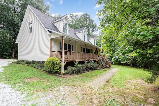 1176 Stoney Mountain Rd, Rougemont, NC 27572 - view of side of home featuring covered porch, a yard, a shingled roof, and stairs
