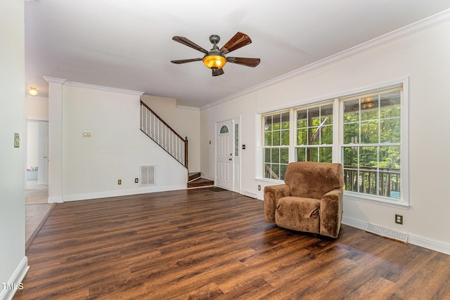 1176 Stoney Mountain Rd, Rougemont, NC 27572 - living area with crown molding, stairway, a ceiling fan, wood finished floors, and plenty of natural light