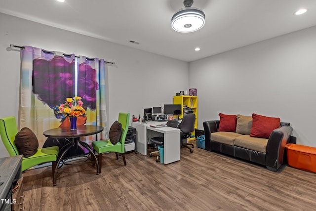 office space featuring visible vents, recessed lighting, and wood finished floors