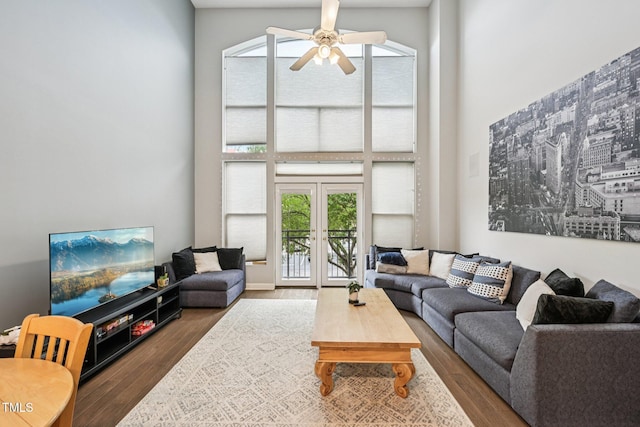 200 S Dawson St Unit 114, Raleigh, NC 27601 - living room featuring a towering ceiling, ceiling fan, wood finished floors, and french doors