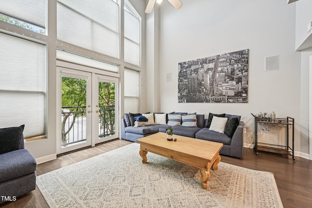 200 S Dawson St Unit 114, Raleigh, NC 27601 - living area with a high ceiling, wood finished floors, and ceiling fan