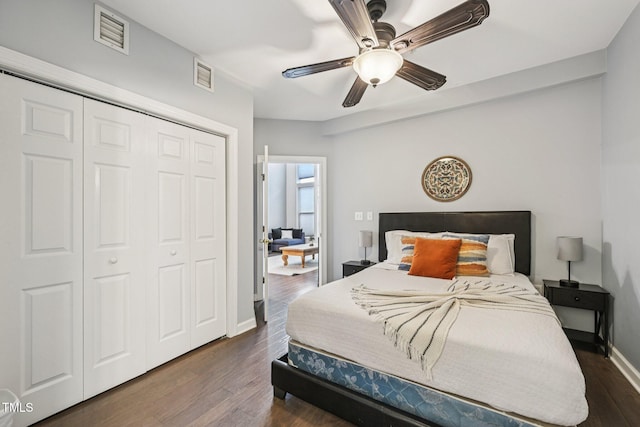 200 S Dawson St Unit 114, Raleigh, NC 27601 - bedroom featuring a closet, dark wood-style floors, and ceiling fan