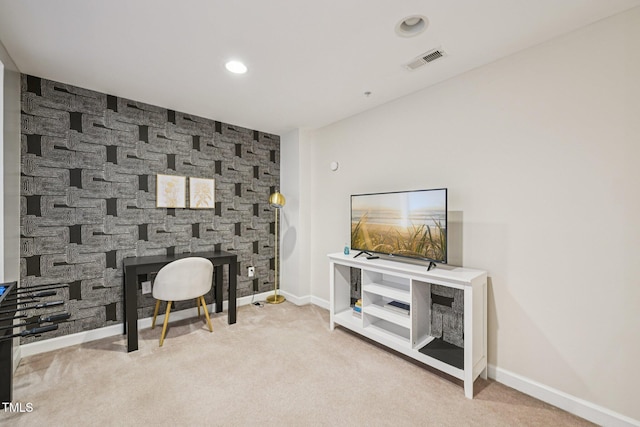 200 S Dawson St Unit 114, Raleigh, NC 27601 - carpeted home office with recessed lighting, an accent wall, and a stone fireplace