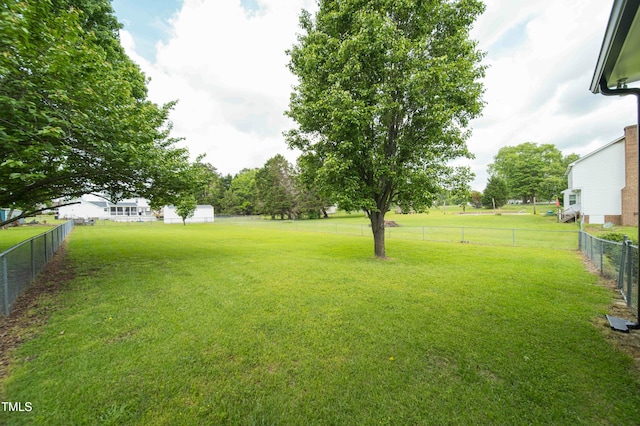 view of yard featuring fence
