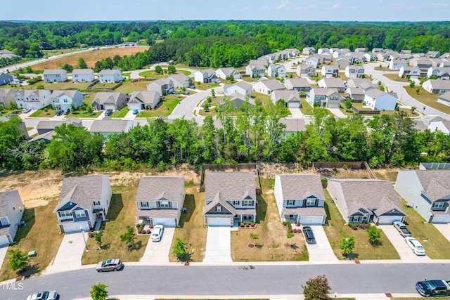224 Brisk Dr, Zebulon, NC 27597 - aerial view of residential area featuring a forest