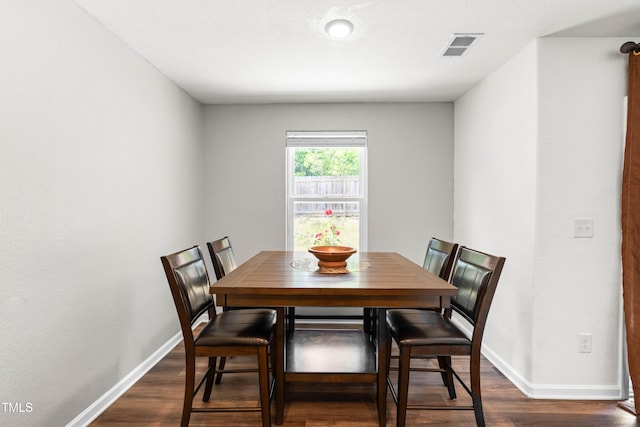 224 Brisk Dr, Zebulon, NC 27597 - dining room with dark wood finished floors and baseboards