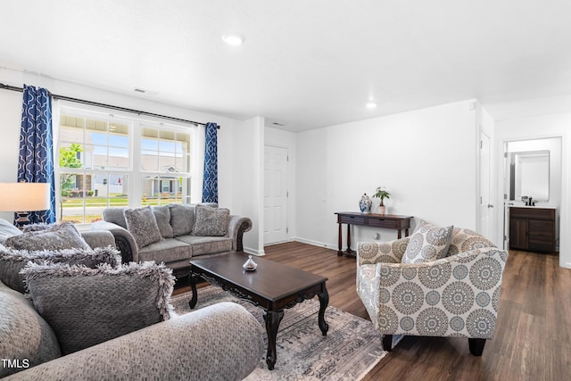224 Brisk Dr, Zebulon, NC 27597 - living area with wood finished floors, recessed lighting, and baseboards