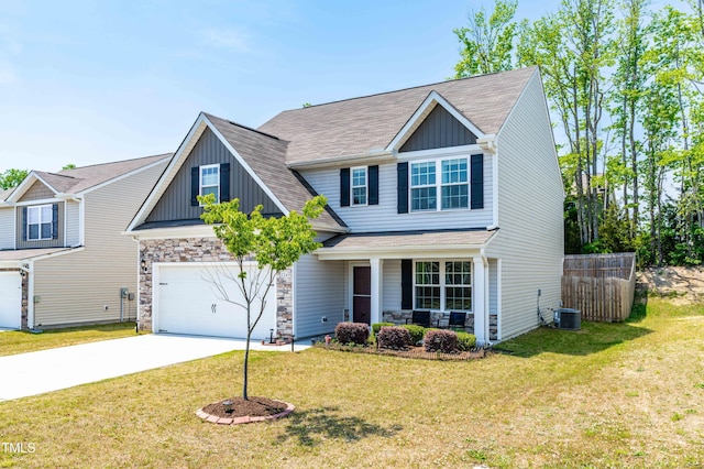 224 Brisk Dr, Zebulon, NC 27597 - craftsman house with board and batten siding, driveway, a porch, roof with shingles, and cooling unit