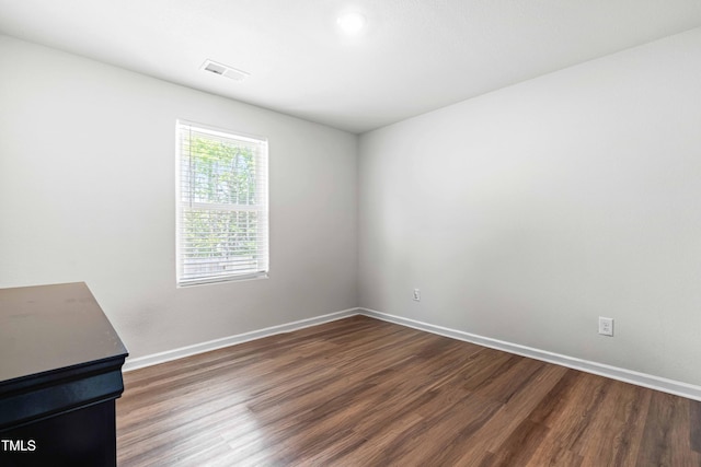 224 Brisk Dr, Zebulon, NC 27597 - empty room featuring dark wood-style floors and baseboards