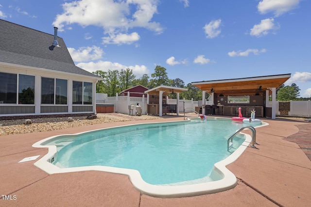 view of pool with a patio and a fenced backyard