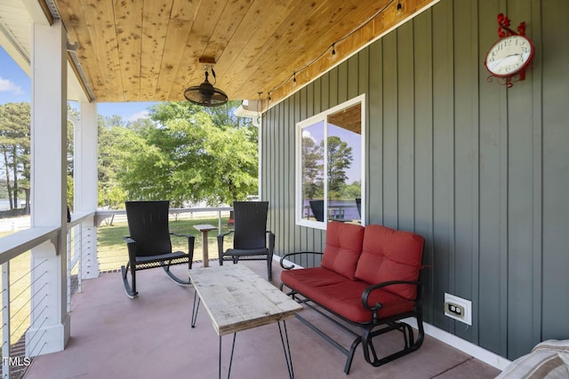 view of patio featuring a porch