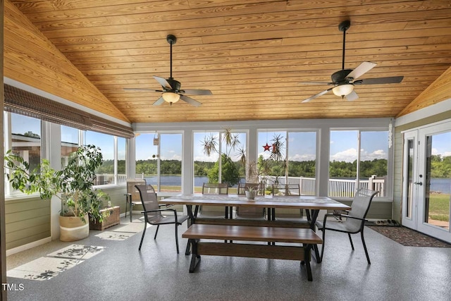 sunroom featuring vaulted ceiling and wooden ceiling
