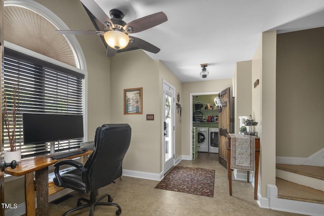 office with washer and clothes dryer, a ceiling fan, and baseboards