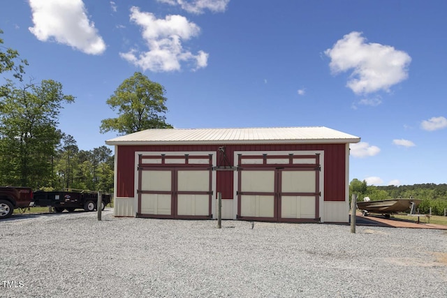 detached garage with a shed