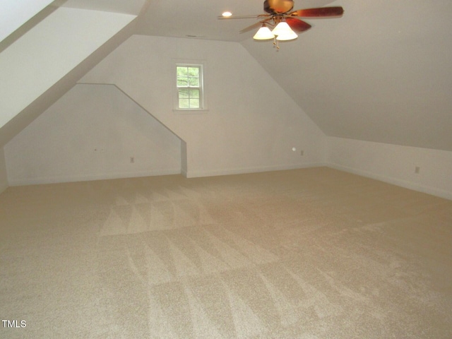 additional living space featuring carpet flooring, ceiling fan, recessed lighting, baseboards, and vaulted ceiling