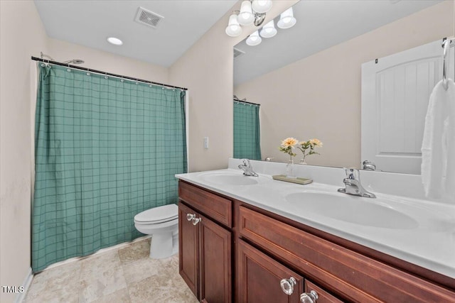 full bathroom featuring a sink, toilet, double vanity, and visible vents