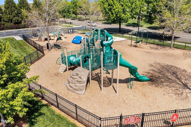 view of home's community with fence and playground community