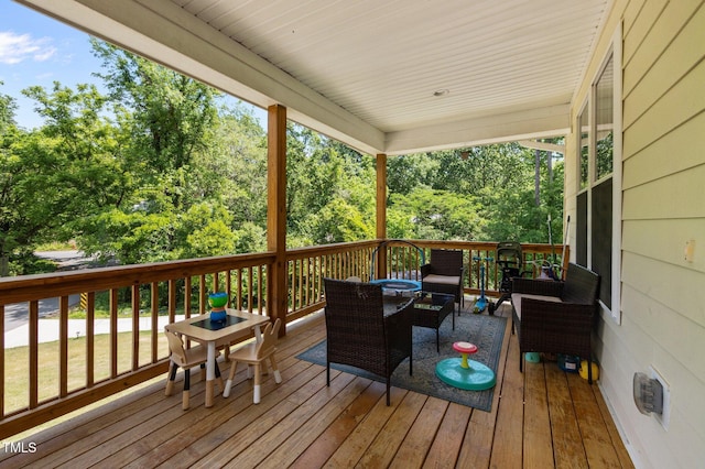 2003 Wa Wa Ave, Durham, NC 27707 - wooden terrace with outdoor dining area