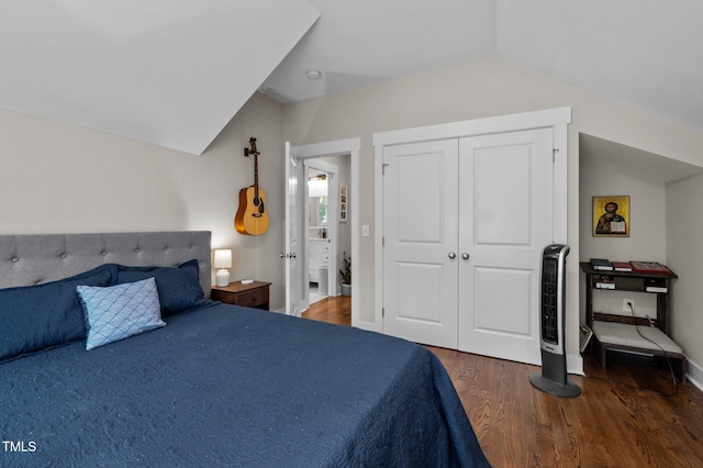 2003 Wa Wa Ave, Durham, NC 27707 - bedroom with a closet, baseboards, lofted ceiling, and wood finished floors