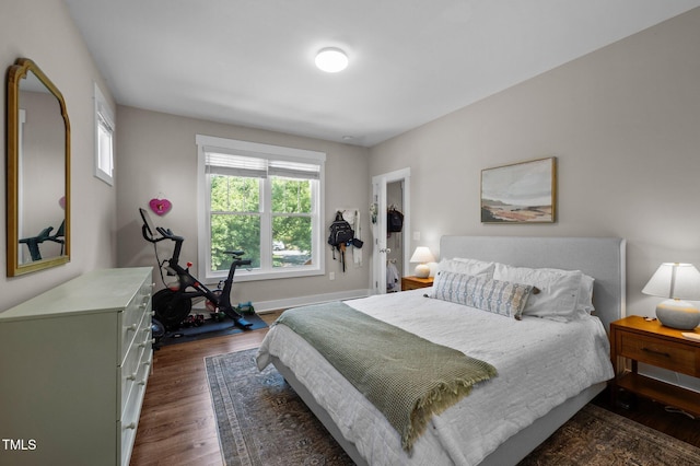 2003 Wa Wa Ave, Durham, NC 27707 - bedroom featuring baseboards and dark wood-style flooring