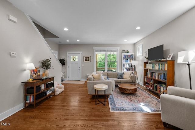 2003 Wa Wa Ave, Durham, NC 27707 - living room with recessed lighting, baseboards, wood finished floors, and stairway