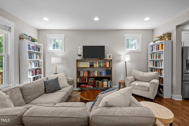 2003 Wa Wa Ave, Durham, NC 27707 - living area featuring a healthy amount of sunlight, recessed lighting, and wood finished floors