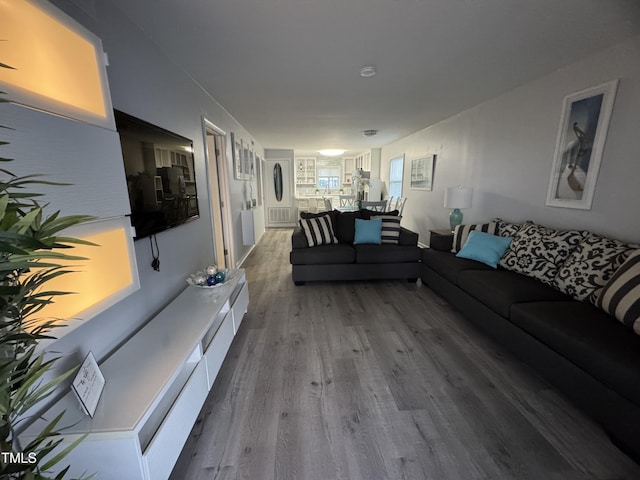 504 Carolina Beach Ave S Unit 2L, Carolina Beach, NC 28428 - living room featuring dark wood finished floors
