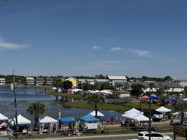 504 Carolina Beach Ave S Unit 2L, Carolina Beach, NC 28428 - view of asphalt street featuring a water view and a residential view