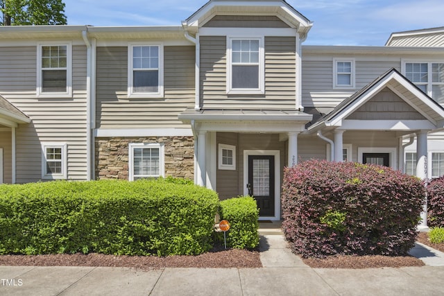 multi unit property with stone siding