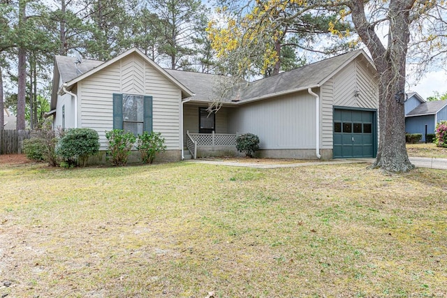 5516 Deep Hollow Ct, Fayetteville, NC 28311 - single story home with a front lawn, a garage, covered porch, and roof with shingles