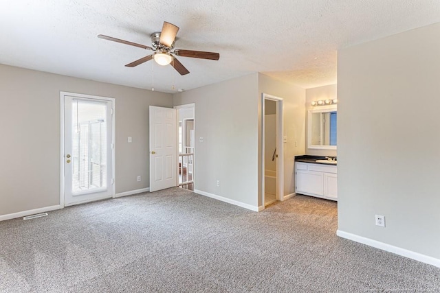 5516 Deep Hollow Ct, Fayetteville, NC 28311 - unfurnished bedroom featuring light colored carpet, ensuite bathroom, and baseboards