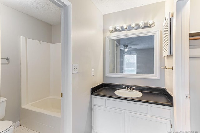 5516 Deep Hollow Ct, Fayetteville, NC 28311 - full bath with a textured ceiling, toilet, shower / bath combination, vanity, and tile patterned flooring