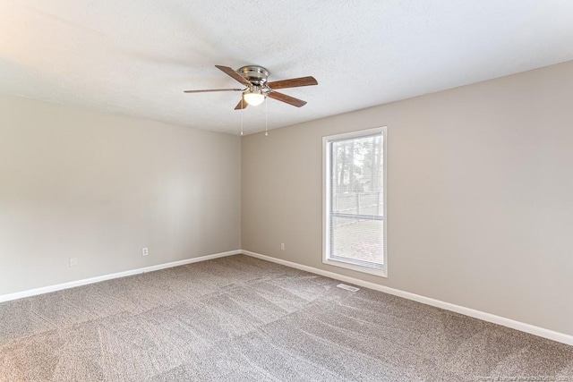 5516 Deep Hollow Ct, Fayetteville, NC 28311 - unfurnished room featuring baseboards, a ceiling fan, and carpet