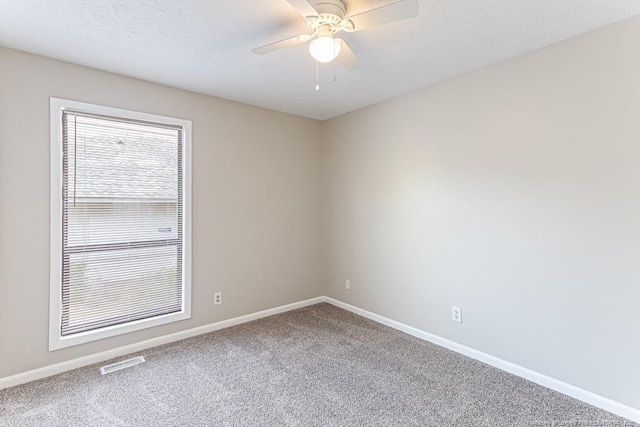 5516 Deep Hollow Ct, Fayetteville, NC 28311 - unfurnished room featuring visible vents, a ceiling fan, carpet flooring, and baseboards