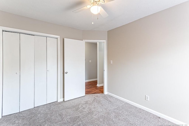 5516 Deep Hollow Ct, Fayetteville, NC 28311 - unfurnished bedroom with baseboards, a ceiling fan, carpet floors, and a closet