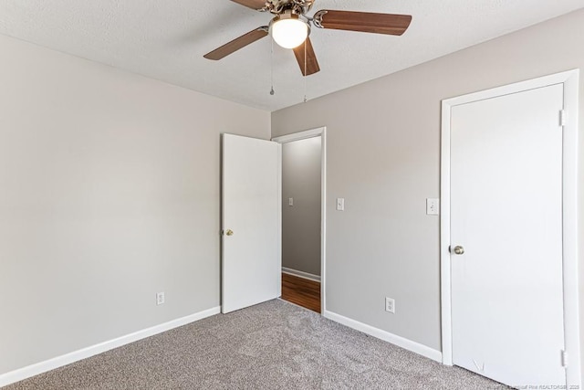 5516 Deep Hollow Ct, Fayetteville, NC 28311 - unfurnished bedroom with carpet, a ceiling fan, and baseboards