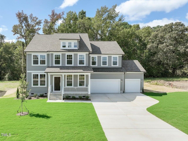 view of front of property featuring covered porch, a shingled roof, a front yard, and concrete driveway