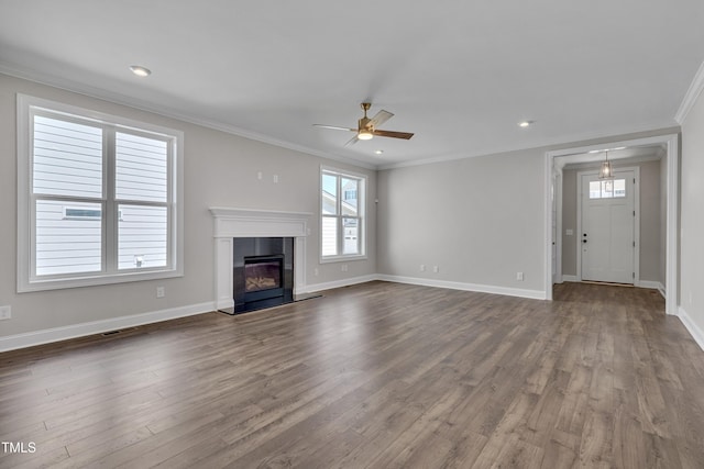 127 Post Oak Rd, Chapel Hill, NC 27516 - unfurnished living room with healthy amount of natural light, ceiling fan, dark wood-type flooring, crown molding, and recessed lighting