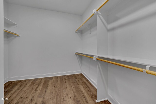 127 Post Oak Rd, Chapel Hill, NC 27516 - walk in closet featuring wood finished floors