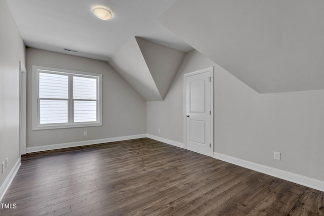 127 Post Oak Rd, Chapel Hill, NC 27516 - bonus room featuring dark wood-type flooring, vaulted ceiling, and baseboards