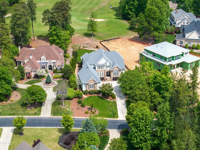 drone / aerial view featuring a residential view and golf course view
