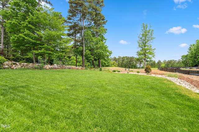 view of yard with fence