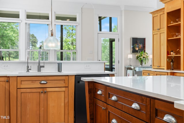 kitchen with open shelves, light countertops, brown cabinets, a sink, and dishwasher