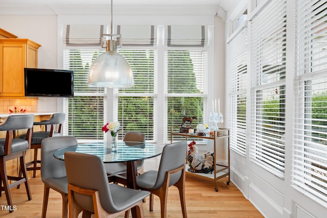 sunroom / solarium with plenty of natural light