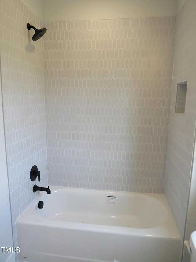 2590 Silas Peak Ln, Apex, NC 27523 - bathroom featuring tub / shower combination and toilet