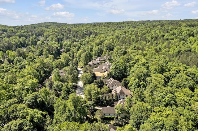 aerial view featuring a view of trees