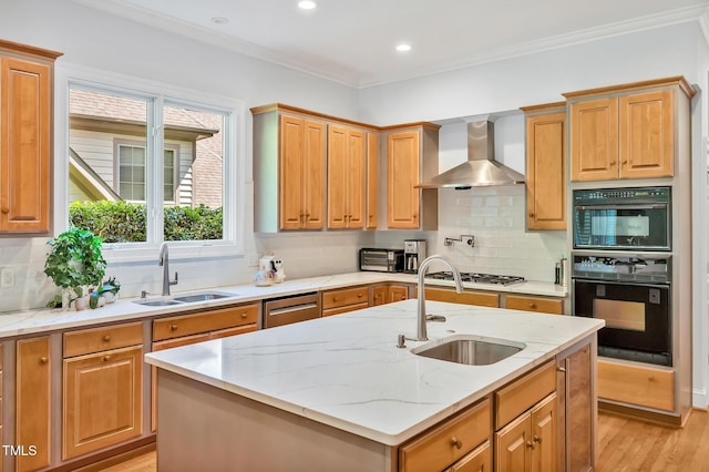 kitchen with a sink, tasteful backsplash, stainless steel appliances, and wall chimney exhaust hood